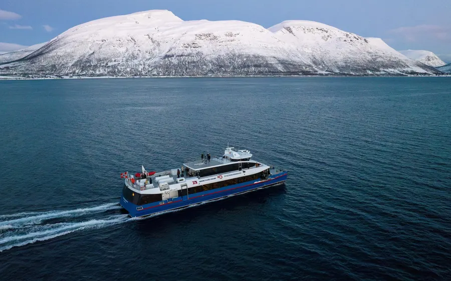 A high-speed catamaran on a whale safari near Tromso